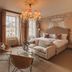 No 15 by GuestHouse, Bath guest room with chandelier, large windows and city view