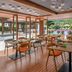 JW Marriott Hotel Hong Kong dining terrace overlooking a pool and garden in Hong Kong