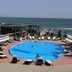 Best Western Bohemian Resort in Sevan with outdoor pool, loungers, and lake view