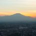 Alila Solo in Surakarta City with mountain views over the city at sunset