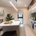 Ashmore Palms Holiday Village kitchen with island, built-in appliances, and balcony view