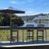 Riverboat Inn and Suites in Madison with river view, bridge, and outdoor deck seating
