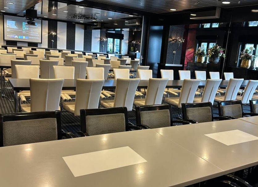 Hotel Pommerloch in Pommerloch meeting room with rows of chairs and long conference tables