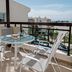 Artemis Cynthia Complex in Paphos balcony with table, chairs and partial sea view