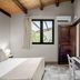 Agriturismo Terra dei Limoni, Noto: bright double room with wood-beam ceiling, window, desk and air conditioning