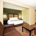 Extended Stay America Suites - Nashville - Airport - Elm Hill Pike room with bed, sofa and desk
