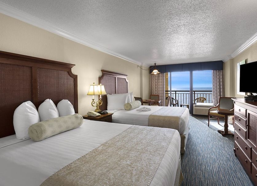 Holiday Pavilion Resort on the Boardwalk in Myrtle Beach guest room with two beds and ocean-view balcony