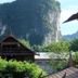 Boutique Village Hotel, Krabi, with tropical garden and limestone cliff backdrop