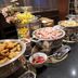 Buffet spread at Cypress Hotel Nagoya-Eki Mae in Nagoya with fried chicken, sausages and assorted dishes