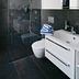 Badhotel Bad Brückenau bathroom with glass walk-in shower and white vanity in Bad Brueckenau
