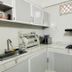 Hostal Casa Torres Centro Historico - Adults Only kitchen in Cartagena with sink, cabinets, stove, and countertop