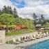 Topnotch Resort in Stowe with outdoor pool, lounge chairs, and mountain-side patio dining