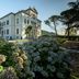 Hotel Villa Soligo in Farra di Soligo, white villa hotel with gardens and mountain views