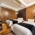 Suwon Ingyedong The Blixx guest room with two beds and wood-paneled walls in Suwon