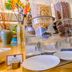 Pace Hotel Suzhou Renmin Road buffet with cereal dispensers, plates and flowers in Suzhou