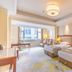 Dongjiao State Guesthouse Nanjing twin-bed guest room with seating area and large window