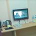 Home Inn Guiyang West Gate room with wall-mounted TV, desk, kettle and luggage rack in Guiyang