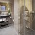 Tiptop Hotel Burgschmiet Garni, Nuremberg bathroom with glass shower and modern vanity