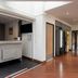 Kyriad Eco Lille Sud - Noyelles Godault lobby reception desk with corridor and vending machines in Noyelles-Godault