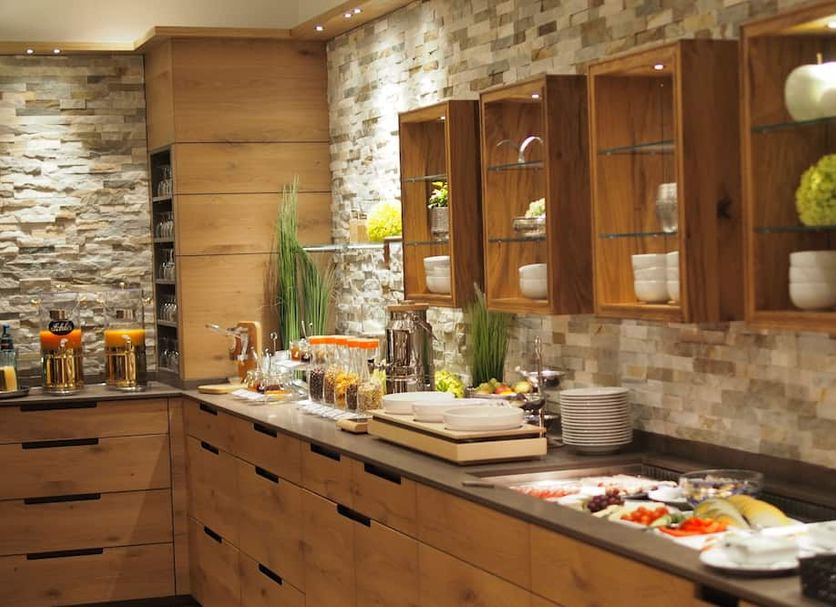 Hotel-Restaurant Bierhäusle breakfast buffet with wooden cabinets in Freiburg im Breisgau