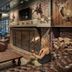 The Historic Cavalier Hotel and Beach Club, Autograph Collection lounge in Virginia Beach with fireplace and mounted deer heads