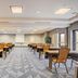Courtyard by Marriott Cincinnati North at Union Centre meeting room in West Chester with rows of tables and chairs