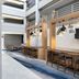 Fairfield Inn & Suites by Marriott Denver Southwest/Lakewood lobby with wood workstations and pendant lights