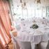 Ristolocanda Grani di Pepe in Flaibano, bright dining room with round tables set for an event