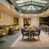 The Nikolai Hamburg - Leonardo Limited Edition lounge with skylight and long dining tables in Hamburg