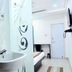 OYO 3815 Hotel Jaisingh Palace in Indore guest room with sink, bed, TV and desk