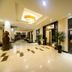 Rock Royal Hotel & Resort in Kep lobby with elevator, polished tile floors, and modern lighting