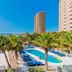 Surf & Sand Hotel in Pensacola Beach with ocean view, palm trees, and outdoor pool