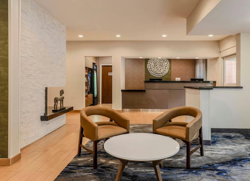 Fairfield Inn & Suites by Marriott Houston Westchase lobby seating area with front desk in Houston