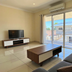 The Phoenix Artesian Spa Resort and Accommodation in Moree living room with balcony and pool view