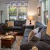 1899 Wright Inn & Carriage House in Asheville: cozy guest lounge with sofas, armchair, and coffee table