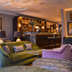 Althoff St James's Hotel & Club London in London, a lounge with velvet seating and a stylish bar