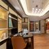 Shengshi Civil Aviation Hotel, Zhengzhou: modern guest room with wood flooring, desk, and lounge seating