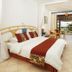 Neptune Beach Resort in Mombasa guest room with king bed and balcony ocean view