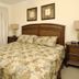 Crystal Towers Gulf Shores bedroom with king bed and balcony ocean view