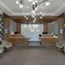 Hilton Garden Inn Sudbury lobby with front desk, modern chandeliers, and seating area