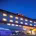 Kumano No Yado Umihikari in Kumano, lit hotel exterior with illuminated windows and festive lights at night