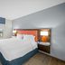 Hampton Inn & Suites Ft. Lauderdale West-Sawgrass/Tamarac room with king bed, TV and window view in Tamarac