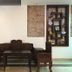 Swiss Hotel Heritage Boutique Melaka lobby seating with carved wooden furniture and wall display shelves in Malacca