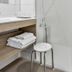 Hôtel Le Mas del Pechs bathroom with walk-in shower, vanity and stool in Sarlat-la-Canéda