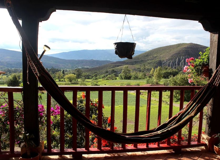 Hotel Spa Casa de Adobe Villa de Leyva balcony hammock with mountain and valley view
