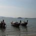 The Krabi Forest Homestay, Ao Nang: long-tail boats floating on a calm beach with distant islands
