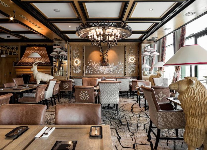 Bachleda Hotel Kasprowy in Zakopane dining room with chandeliers and mountain-style decor