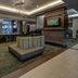 Residence Inn by Marriott Norfolk Downtown lobby with seating area and bar in Norfolk
