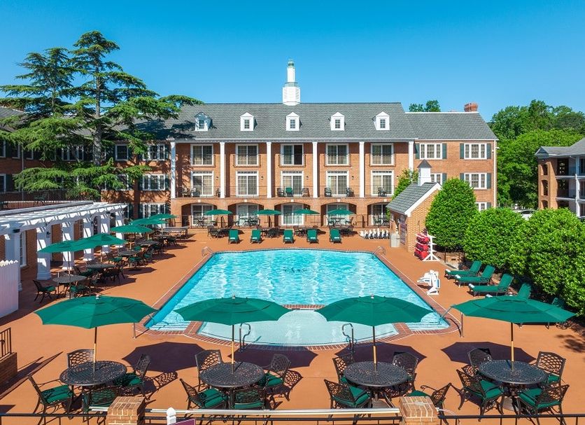 Westgate Historic Williamsburg Resort in Williamsburg with outdoor pool, patio tables and lounge chairs