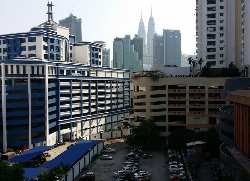 Canary Hotel Kuala Lumpur city view with Petronas Twin Towers and surrounding high-rise buildings